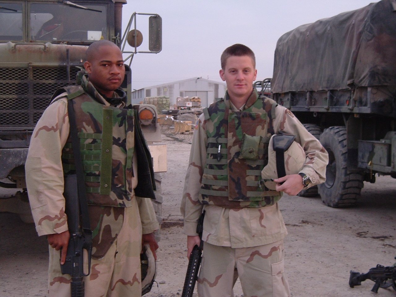 Stephen Cruz (left) with a fellow soldier of the 1014th, March 25, 2004.