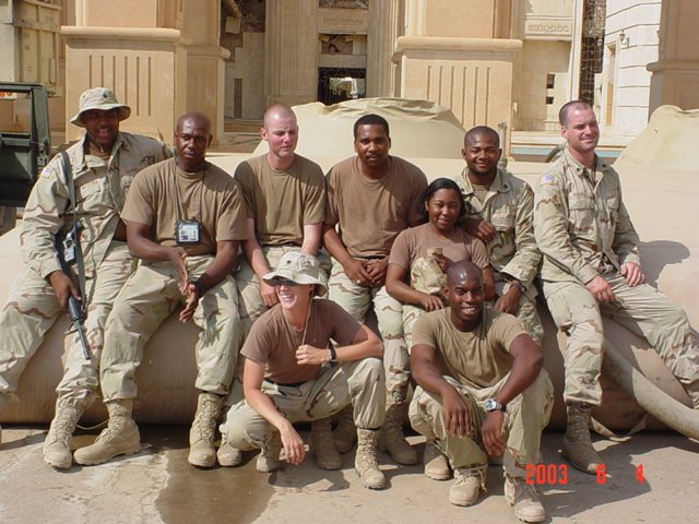 1014th Quartermaster Company soldiers on the steps of a palace, June 2003.